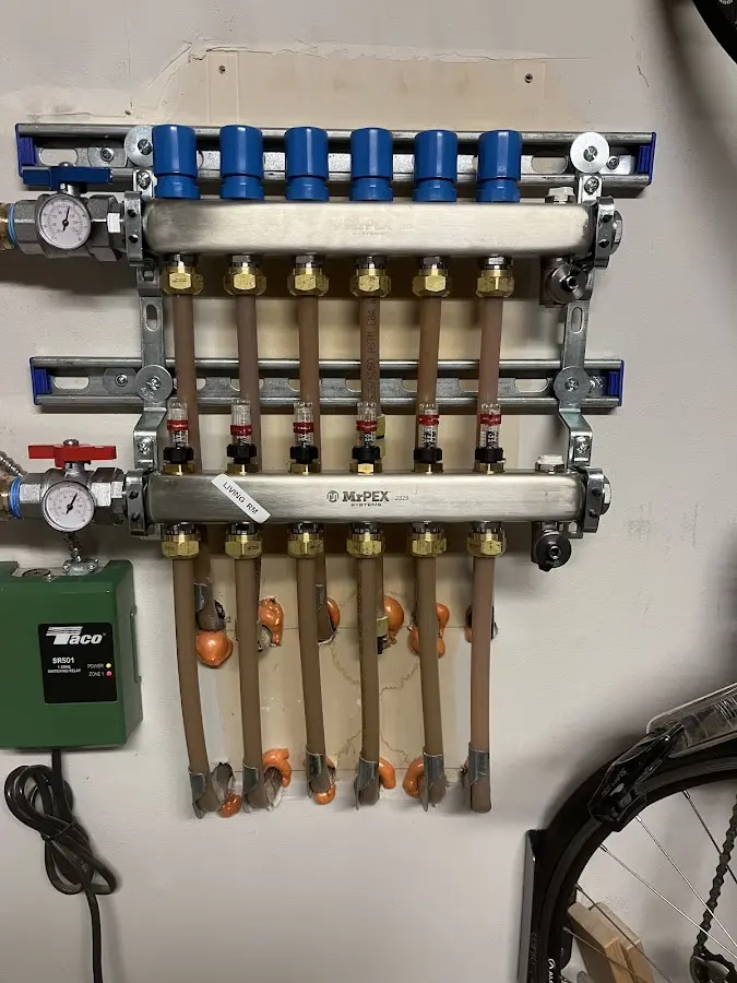 Plumber performing Gas Line Installation at a residential property in Highland Heights